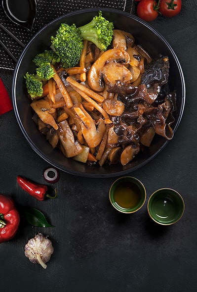 Young bamboo shoots fried with mushrooms